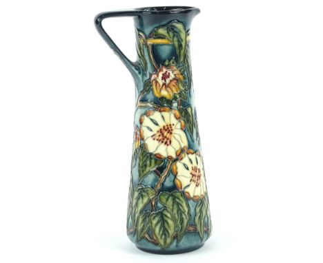 A Moorcroft pottery ewer, decorated overall with flowers by K Goodwin, limited edition number 22 of 400, handwritten and impr