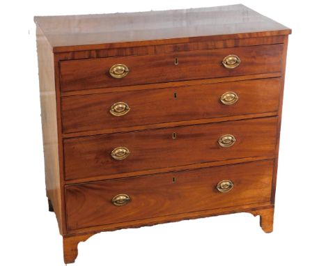 An early 19thC mahogany chest of drawers, the top with a boxwood strung border, above an arrangement of four graduated drawer