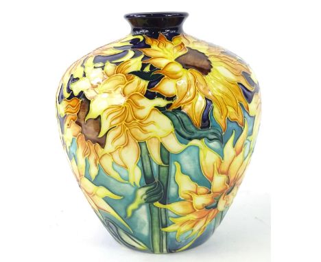 A Moorcroft trial vase, decorated with sunflowers on a purple and green ground, handwritten Trial 12.7.00 JMC and impressed m