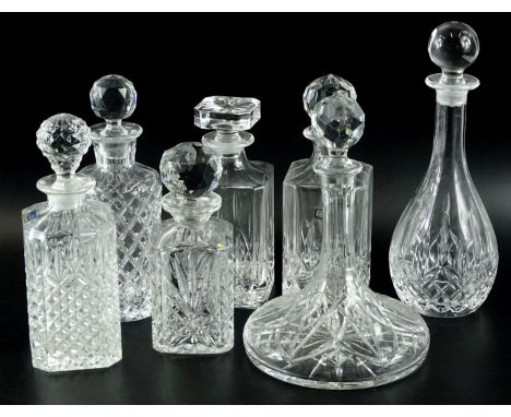 Various cut glass decanters and other decanters and stoppers, to include a ship's decanter, some square section examples, etc