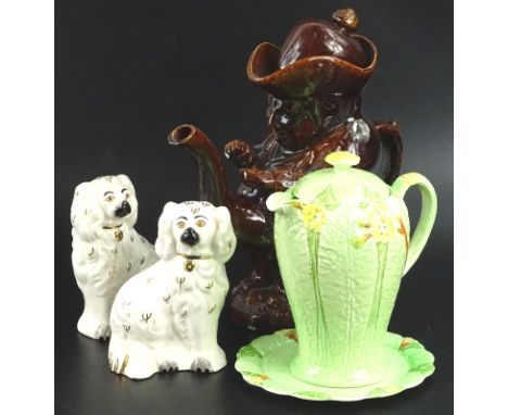 A 19thC Staffordshire treacle glazed Toby shaped teapot, with lid, pair of Beswick Staffordshire type Spaniels and a Royal Mi