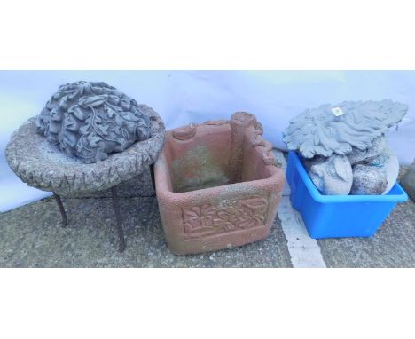 Various garden ornaments etc., to include a terracotta coloured square planter, green men masks, etc.