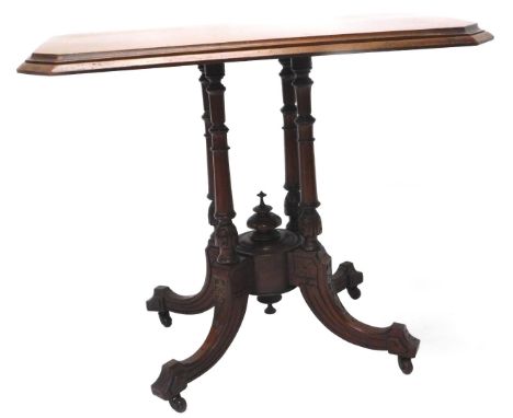 A Victorian mahogany occasional table, the rectangular top with canted corners, on four spindle turned supports with splayed 