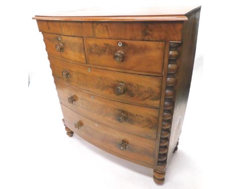 A Victorian figured mahogany bowfront chest of drawers, the top with a moulded edge above two short and three long drawers, e