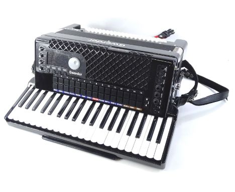 A 20thC Gwerder digital piano accordion, 55cm W, cased.  (with paperwork)