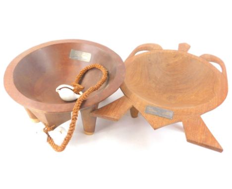 A carved Fijian ceremonial bowl, with rope and shell attachment, bearing presentation plaque engraved Malcolm and Bea With Be