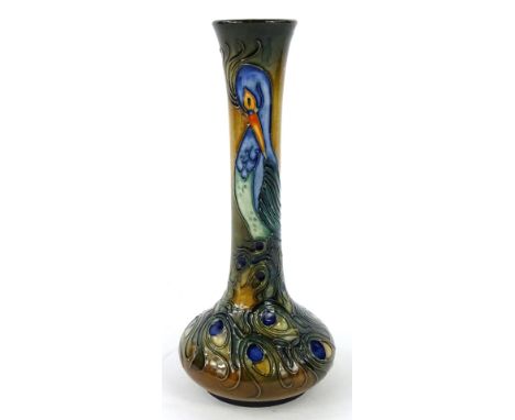 A Moorcroft Phoenix bird pattern vase, decorated with a bird on a mottled khaki and orange ground, designed by Rachel Bishop,