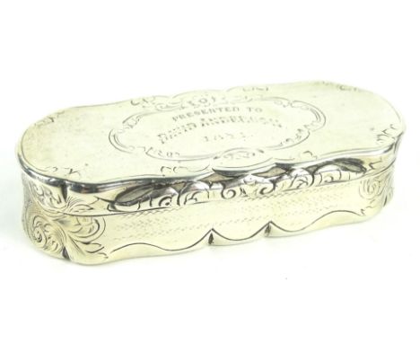 A Victorian silver snuff box, the hinged lid engraved 'Presented to David Anderson 1871', with engine turned decoration and a