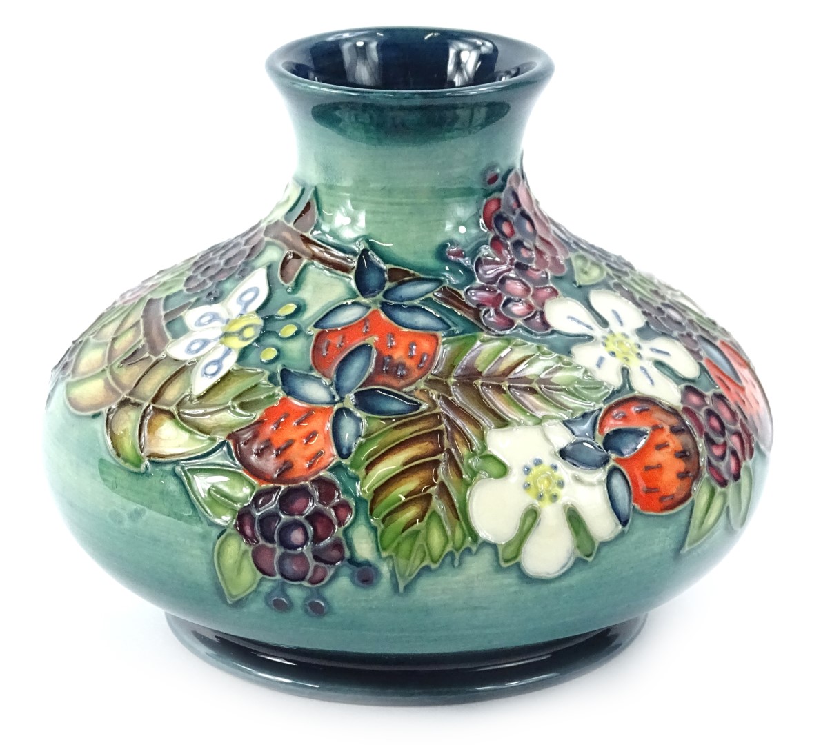 A Moorcroft centenary year carousel range vase, decorated with wild ...