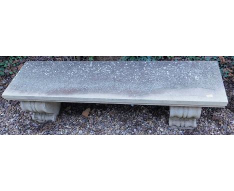 A composition garden bench, on scroll cast supports, 168cm W.