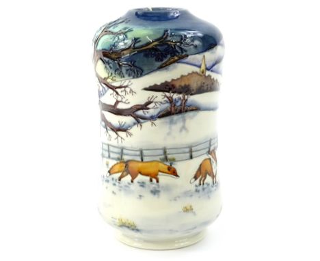 A Moorcroft Woodside Farm pattern vase, decorated with a winter landscape with foxes etc., signed to underside Anji Davenport