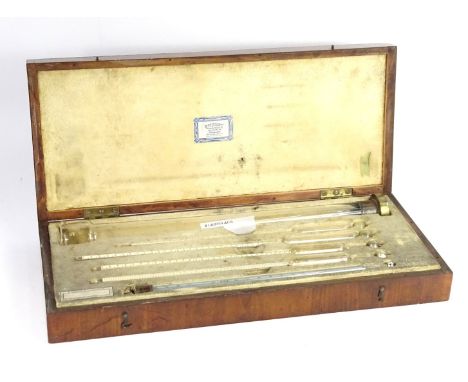A set of five Mercury thermometers, and a test tube with weighted brass base, stamped R Griffin and Co of Glasgow in original