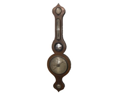 A mid 19thC mahogany wheel barometer by James Usher, Cornhill, Lincoln, with a dry damp gauge, convex mirror, thermometer and