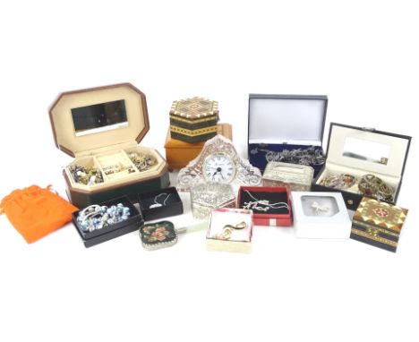 Various modern costume jewellery and trinkets, to include charm bracelets, Avon jewellery, glass mantel clock, trinket boxes,