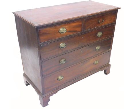 An early 19thC mahogany chest of drawers, the rectangular top with a moulded edge above two short and three long drawers on b