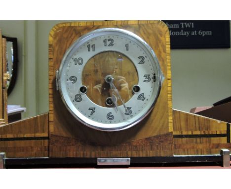 An Art Deco tulip banded chrome mounted eight day walnut mantle clock