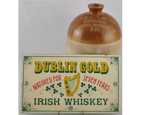 A vintage enamel advertising sign for Dublin Gold Irish Whiskey, 18.5 x 31cm, together with a saltglazed stoneware bottle, st