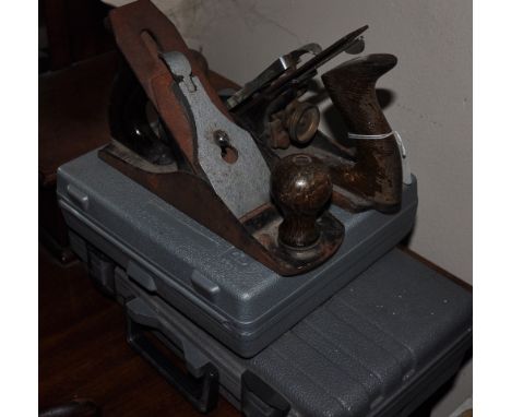 A pair of Stanley smoothing planes and assorted tools