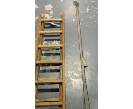 A vintage Youngman seven tred extending ladder together with a vintage long arm pruner