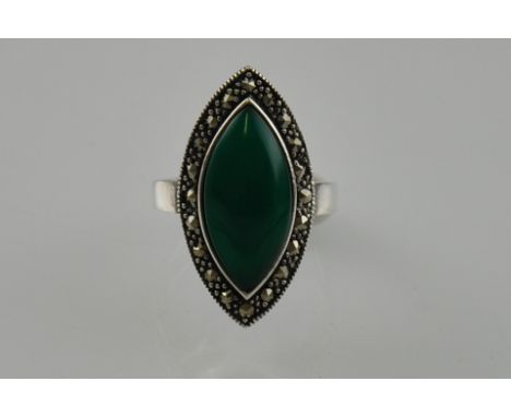 A silver, marcasite and jade ring