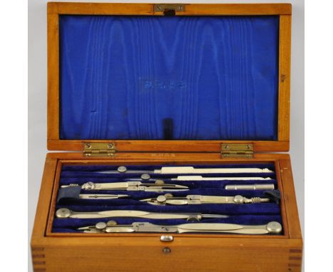 A vintage draughtsman's set in original wood case