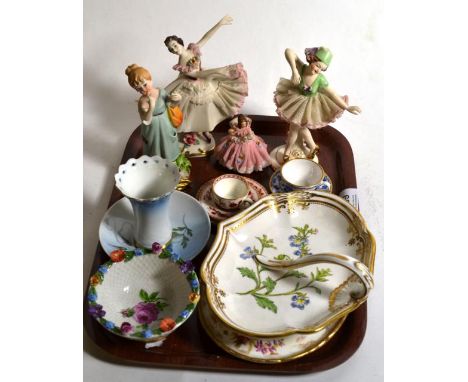 A tray including three German china figurines; a Coalport miniature trio; Spode miniature; blue and white cup and saucer; Cop