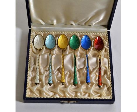 A set of six silver, silver gilt and enamel coffee spoons stamped Denmark Sterling 925