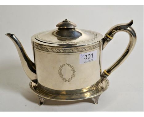 A George III silver teapot and stand, John Emes, London 1799/1800, the handle a Victorian replacement, Henry Holland, London,