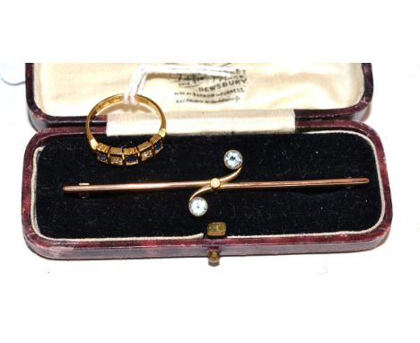 An 18 carat gold five stone diamond and sapphire ring, finger size M; and a two stone bar brooch, stamped '9ct', cased (2).  