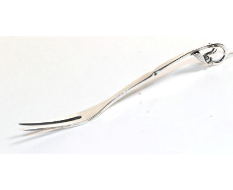 A Georg Jensen silver pickle fork, import marks for George Stockwell, London 1921, pattern 21