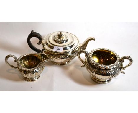 A matched silver three piece tea service, comprising: teapot, James McKay, Edinburgh 1819; twin handled sugar bowl, probably 