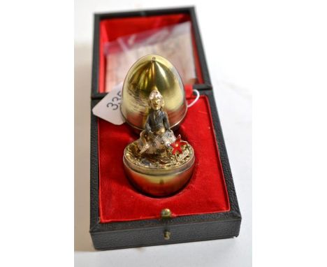 Stuart Devlin: a silver gilt surprise egg, London 1975, 'Pixie', the interior featuring a pixie sat on a toadstool, numbered 