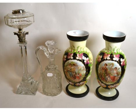A cut glass oil lamp; a pair of opaline vases; and a decanter 