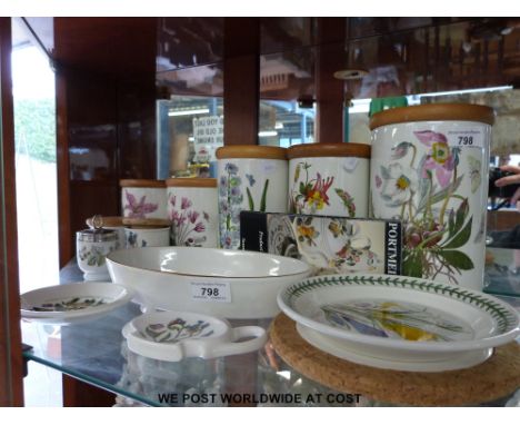 A collection of Portmeirion storage jars, tea pot stand, dishes etc and a Royal Worcester Evesham oval dish 