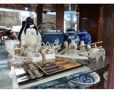 A collection of crested ware including Goss, Carlton ware, Wedgwood, ginger jars and a ceramic penguin 