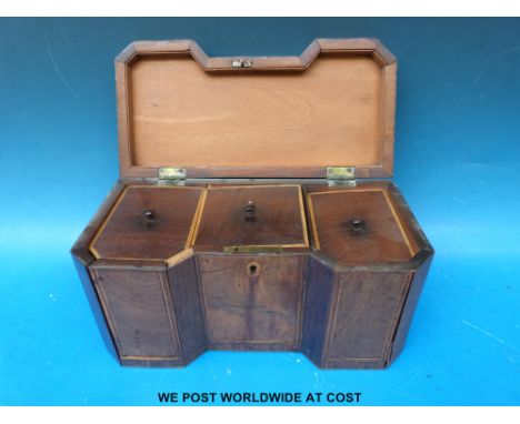 An inverted breakfront Georgian mahogany tea caddy with line inlay, opening to reveal three lidded compartments