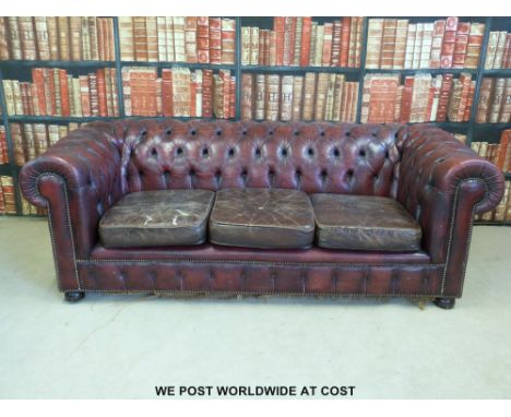 Chesterfield red leather button back three seat sofa. 