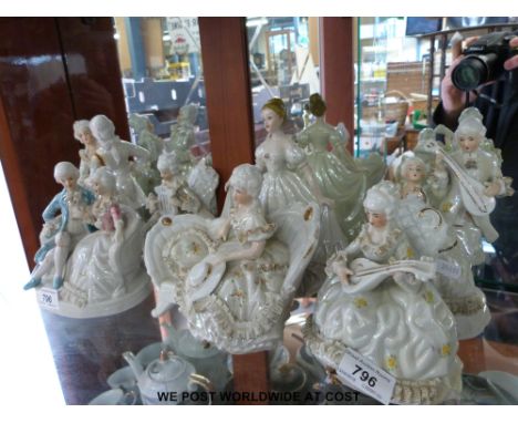 A quantity of decorative ceramic figurines 