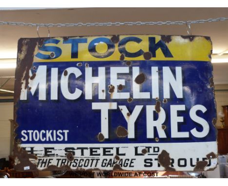 A Michelin Tyres enamel sign with H.E. Steel Ltd, The Truscott Garage, Stroud, to lower edge (approximately 101 x 151cm)