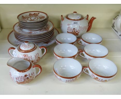 A Japanese tea set to include teapot, jug and sugar basin