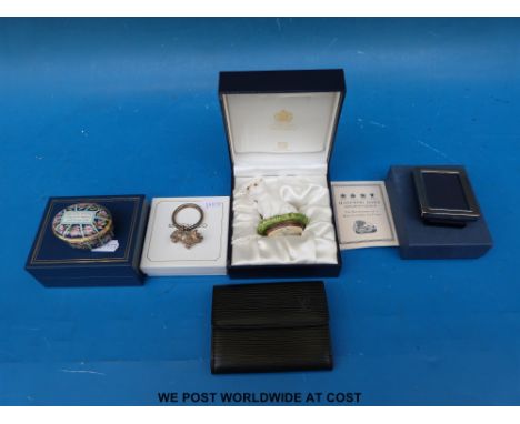A Louis Vuitton purse, hallmarked silver photo frame, Martin & Co. teething ring and two Halcyon days enamel tins 