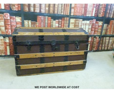 An ash bound dome topped travelling trunk (W77 x D42 x H50cm) 