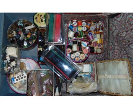 Two suitcases filled with tins of haberdashery, a vintage work box and two unused luggage straps