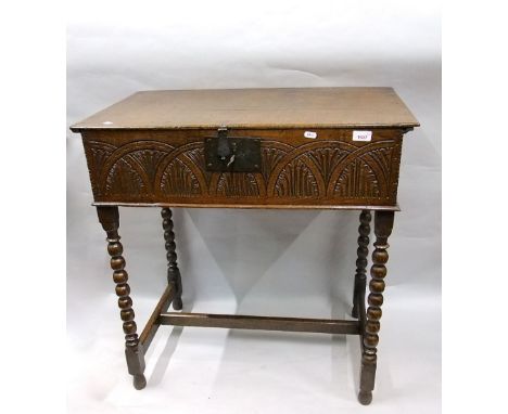18th century oak bible box with steel lock plate and carved repeating geometric frieze work, raised on a later bobbin work st