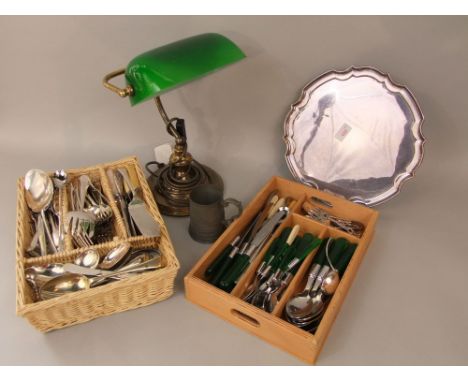 A mixed collection of silver plate to include mainly flatware, a serpentine salver and others; together with a brass and gree