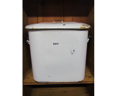A vintage cream enamel bread bin containing a carved oak bread board of circular form with script, Long Life and Happiness, t