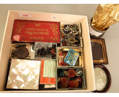 Box of small miscellaneous items - agate panels, gramophone needle tins keys, portrait frames, etc 