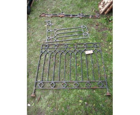Four sections of cast iron railing with gothic tracery detail, two 103 cm long x 88 cm high, the others slightly smaller in l