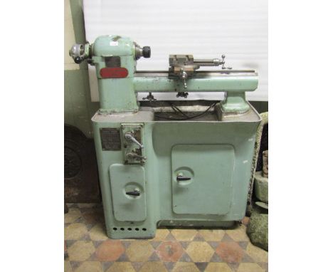 A vintage Smart and Brown of London Ltd engineering lathe model - L, together with a quantity of attachments