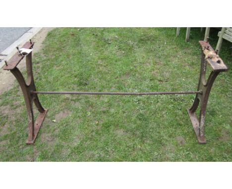 A vintage Great Western Railway cast iron table base with waisted ends united by a central rod, stamped GWR S.Road, traces of